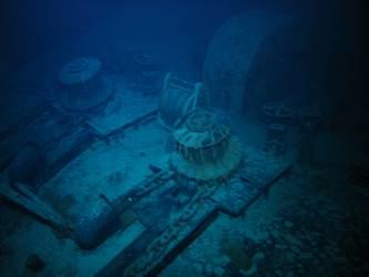 Forecastle capstans and anchor cable secured on deck